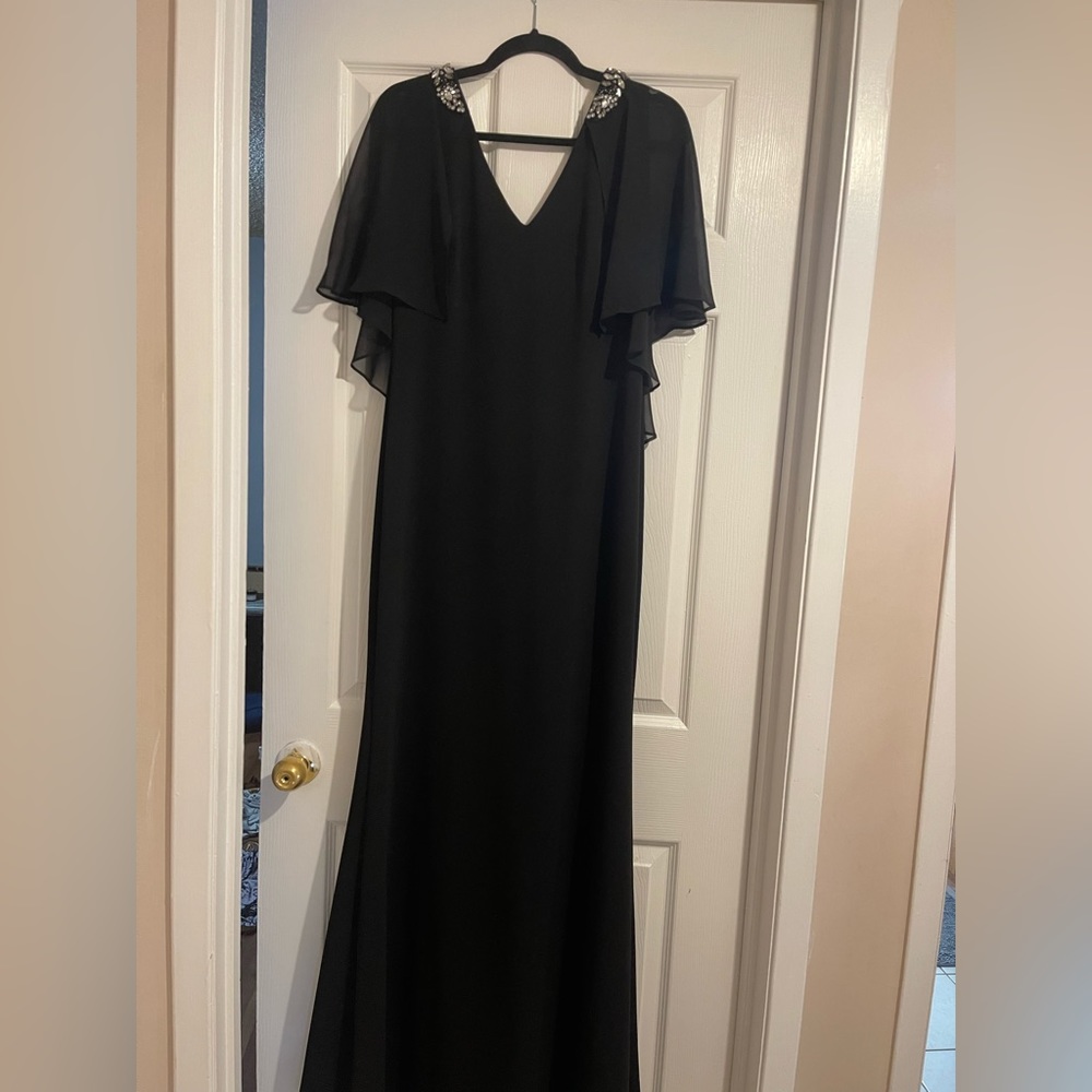 Elegant evening cape dress with embellished shoulders